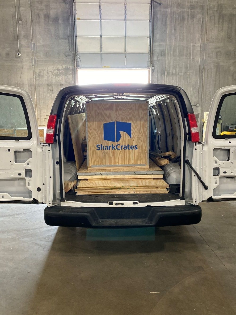 Van with wood shipping crates