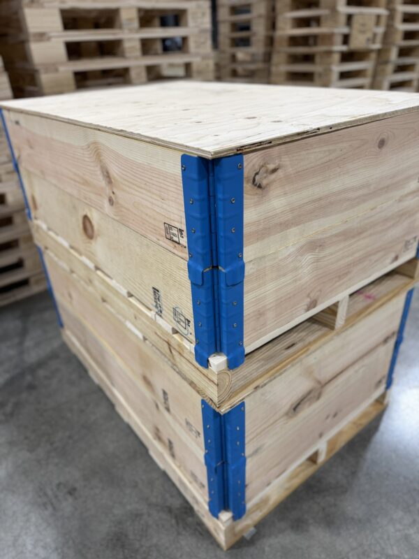 pallet collars stacked warehouse